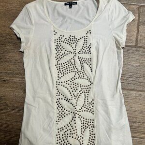 Cream color top with bass tabs